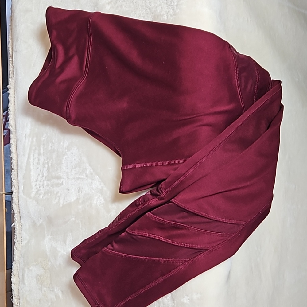 Maurices in motion burgundy exercise leggings.